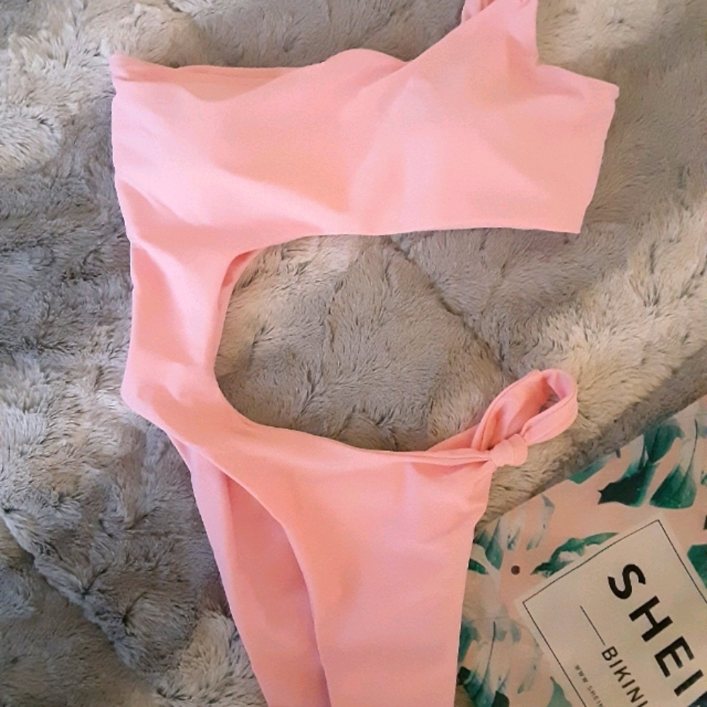 One piece pink bathing suit in a small